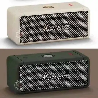 Two portable speakers with metal grille fronts, one cream and one dark green